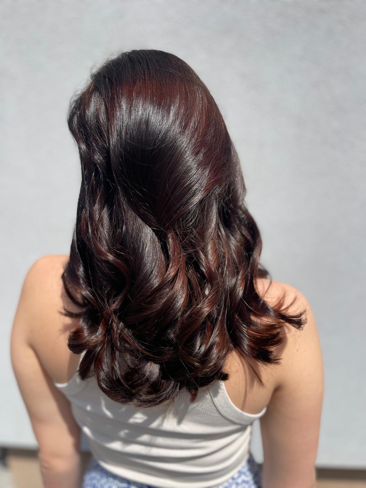 a woman with long brown hair